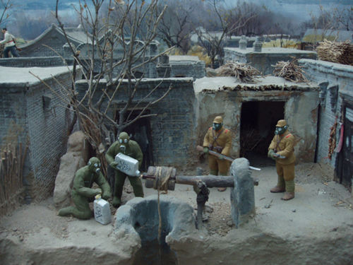 军事纪念馆中日军向井中投毒场景复原模型